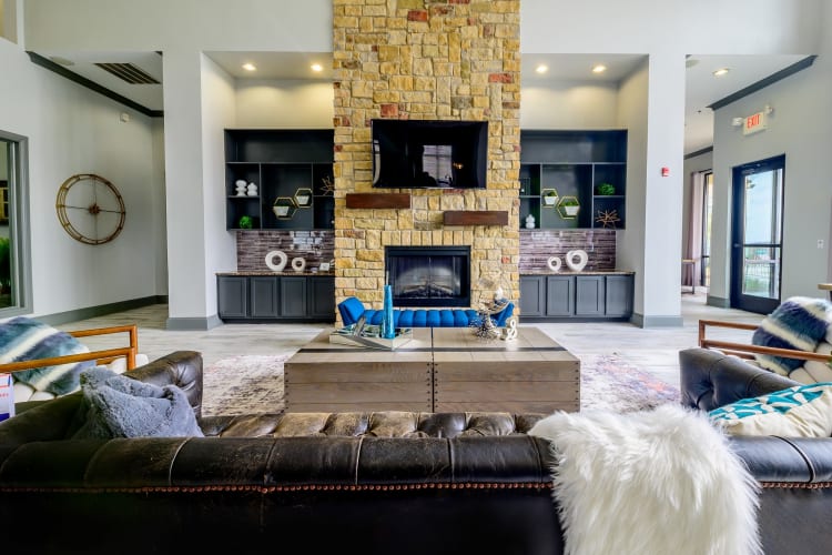 Modern decor in spacious living room of model home at Evolv in Mansfield, Texas
