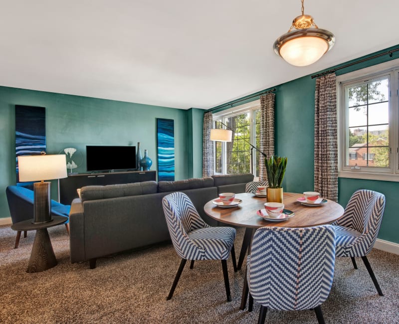 An inviting living room and dining room at Braddock Lee Apartments in Alexandria, Virginia