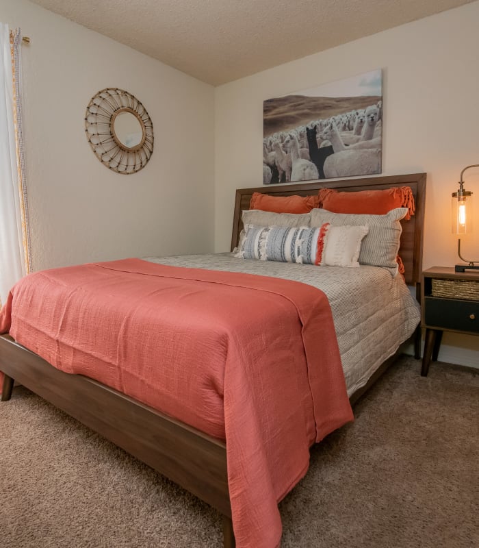 Chic bedroom at Aspen Park Apartments in Wichita, Kansas