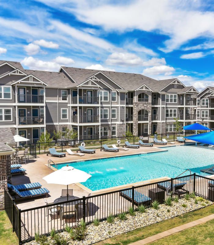 Large swimming pool at Cottages at Abbey Glen Apartments in Lubbock, Texas