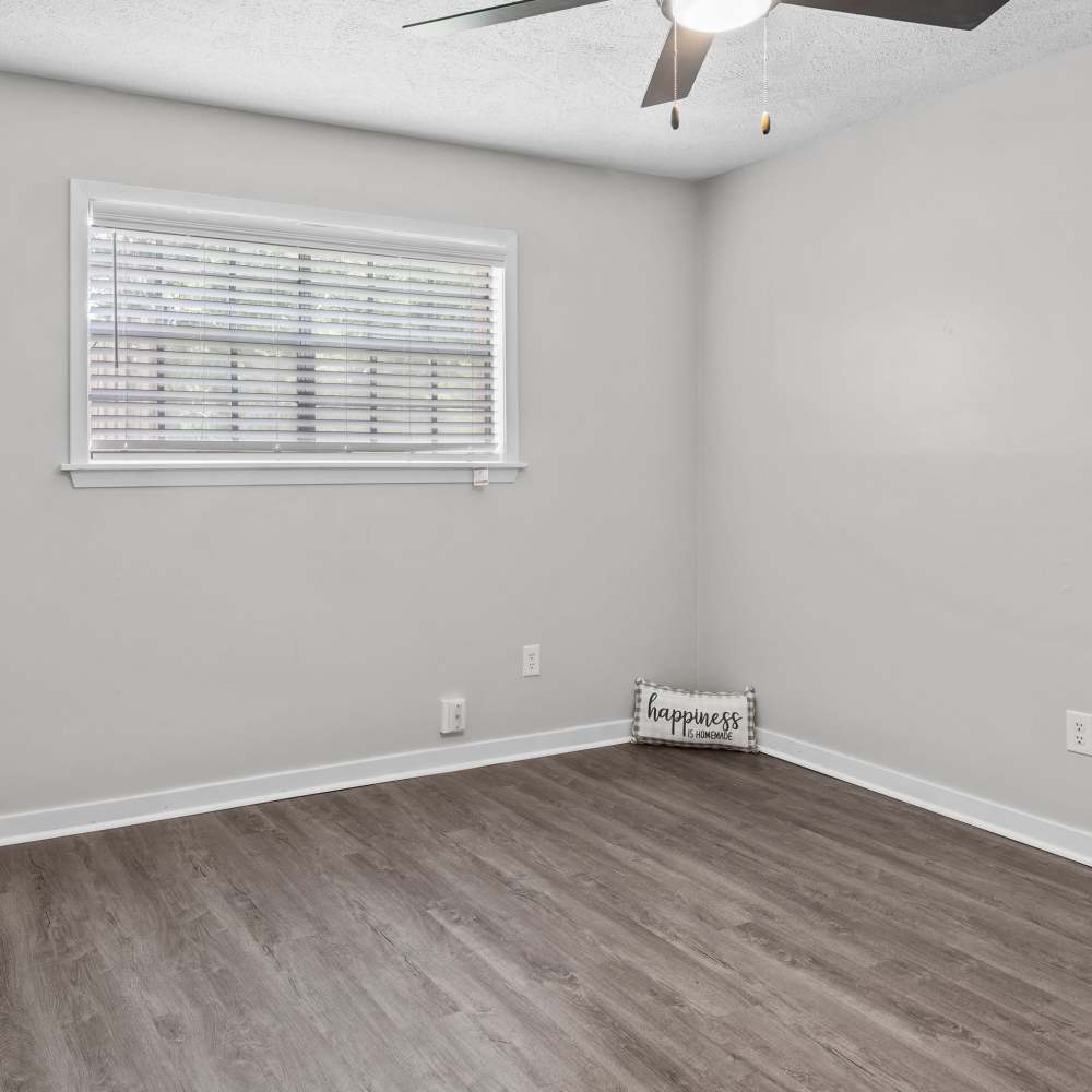 Description at a bright and inviting bedroom in a cozy home in an enchanting neighborhood at Pecan Ridge in Vicksburg, Mississippi