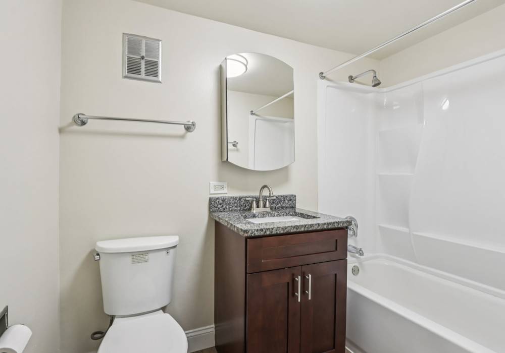 Bathroom with bath-tub at Regents Park Apartments in Bensenville, Illinois