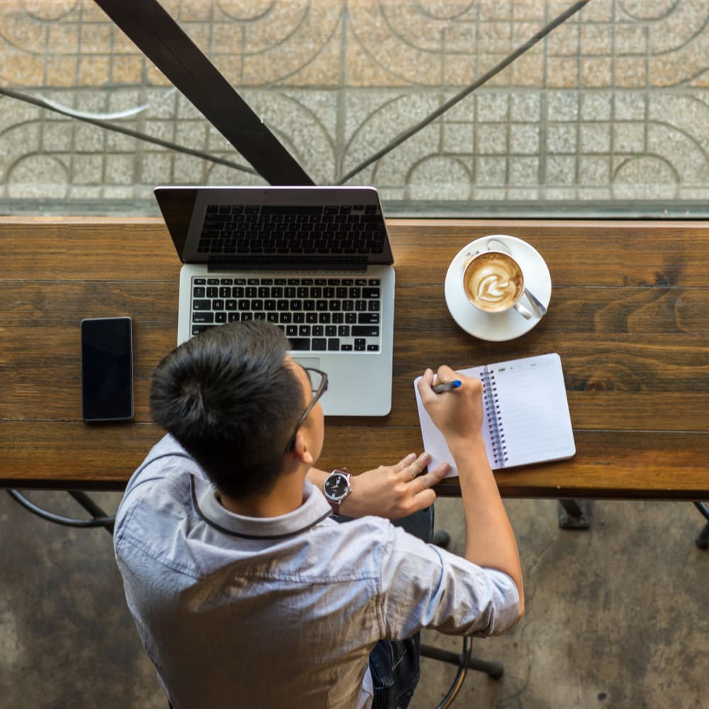 Resident work and drinking coffee at Oaks Minnehaha Longfellow in Minneapolis, Minnesota