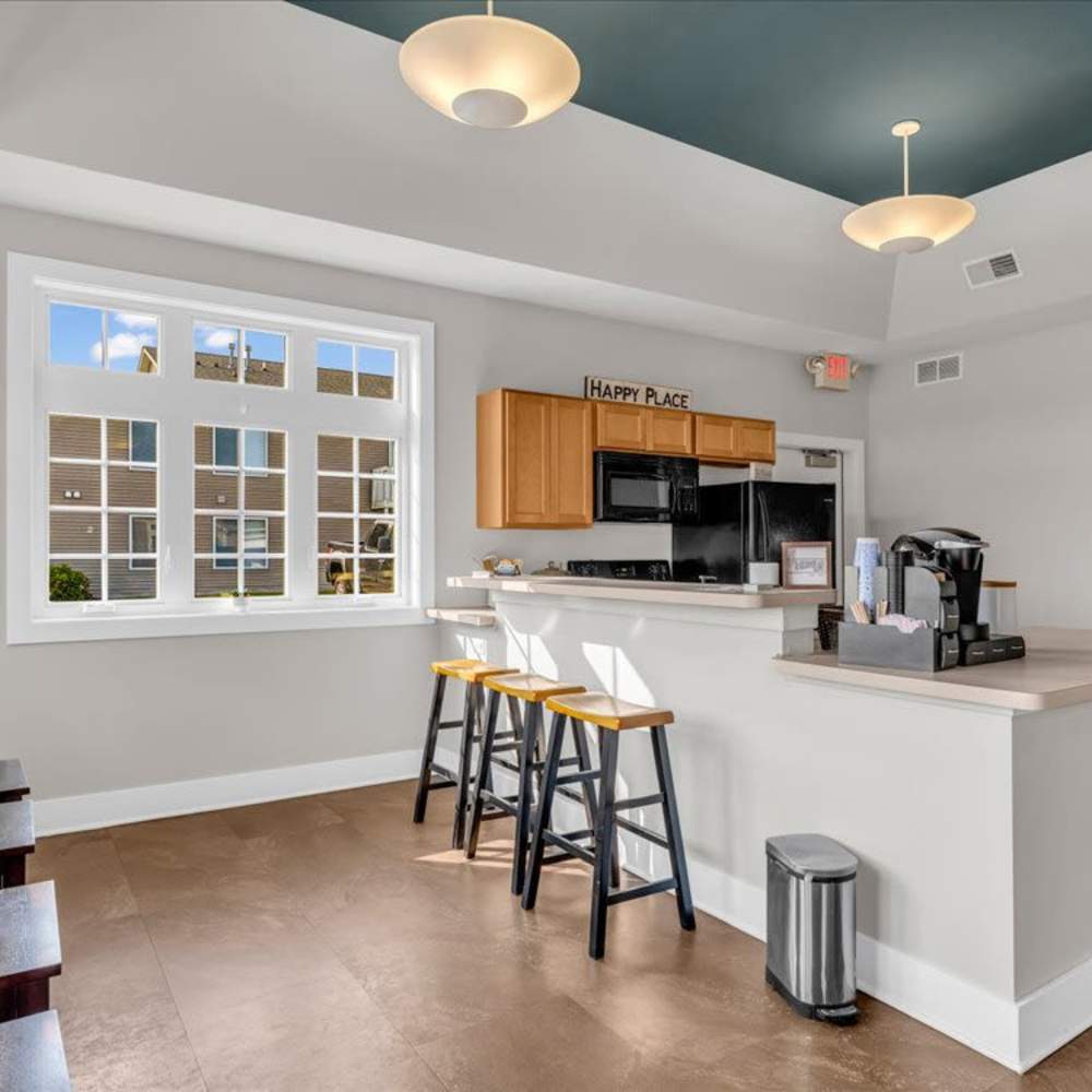 Clubhouse kitchen with breakfast bar at River Club in Holland, Michigan