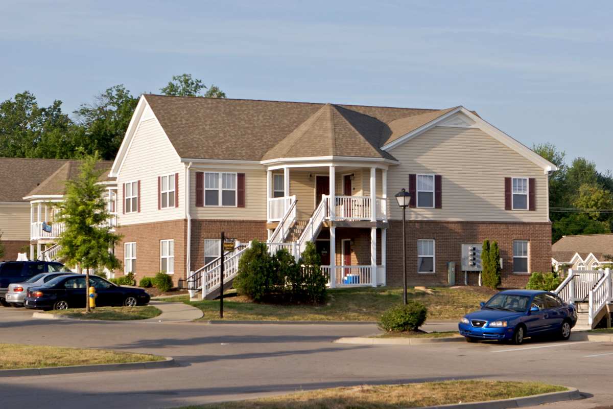 View of the exterior from street at Falcon Crest Apartments in Louisville, Kentucky