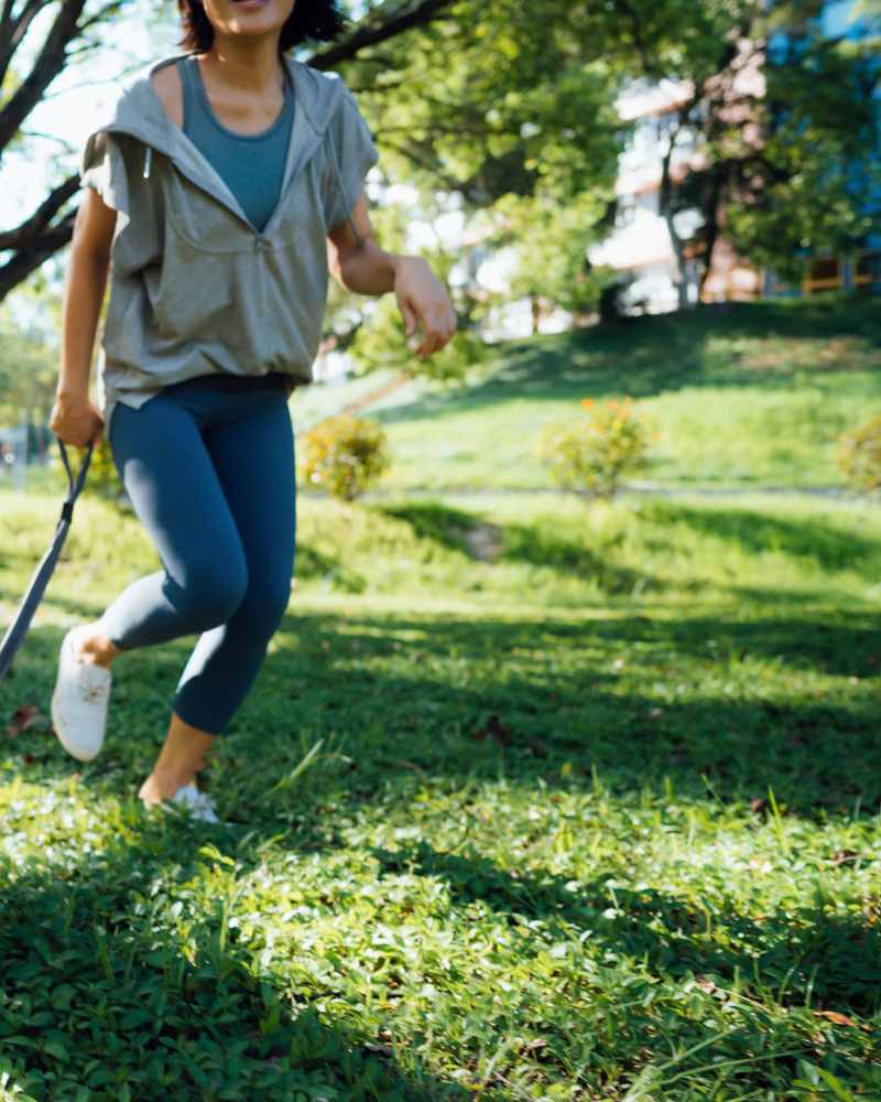 Resident walking dog at Channel House in Raleigh, North Carolina