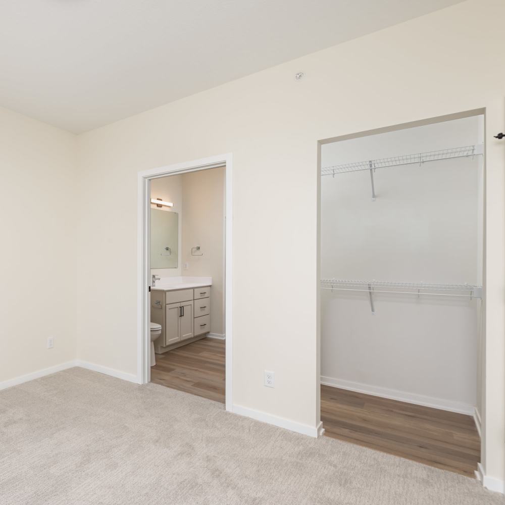 Bedroom with closet at The Uptown Apartments in Waconia, Minnesota