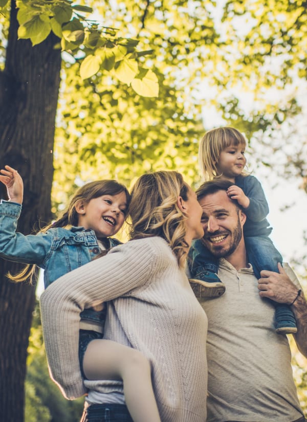 Family playing in the neighborhood near Broad River Trace in Columbia, South Carolina