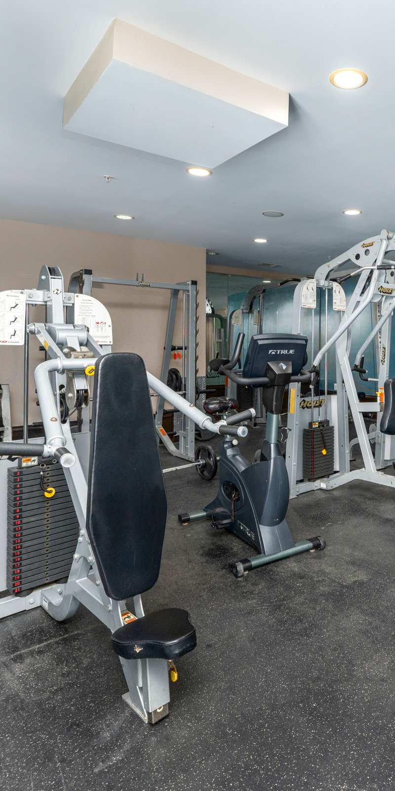 Fitness center with cardio machines at Mazza Grandmarc in College Park, Maryland