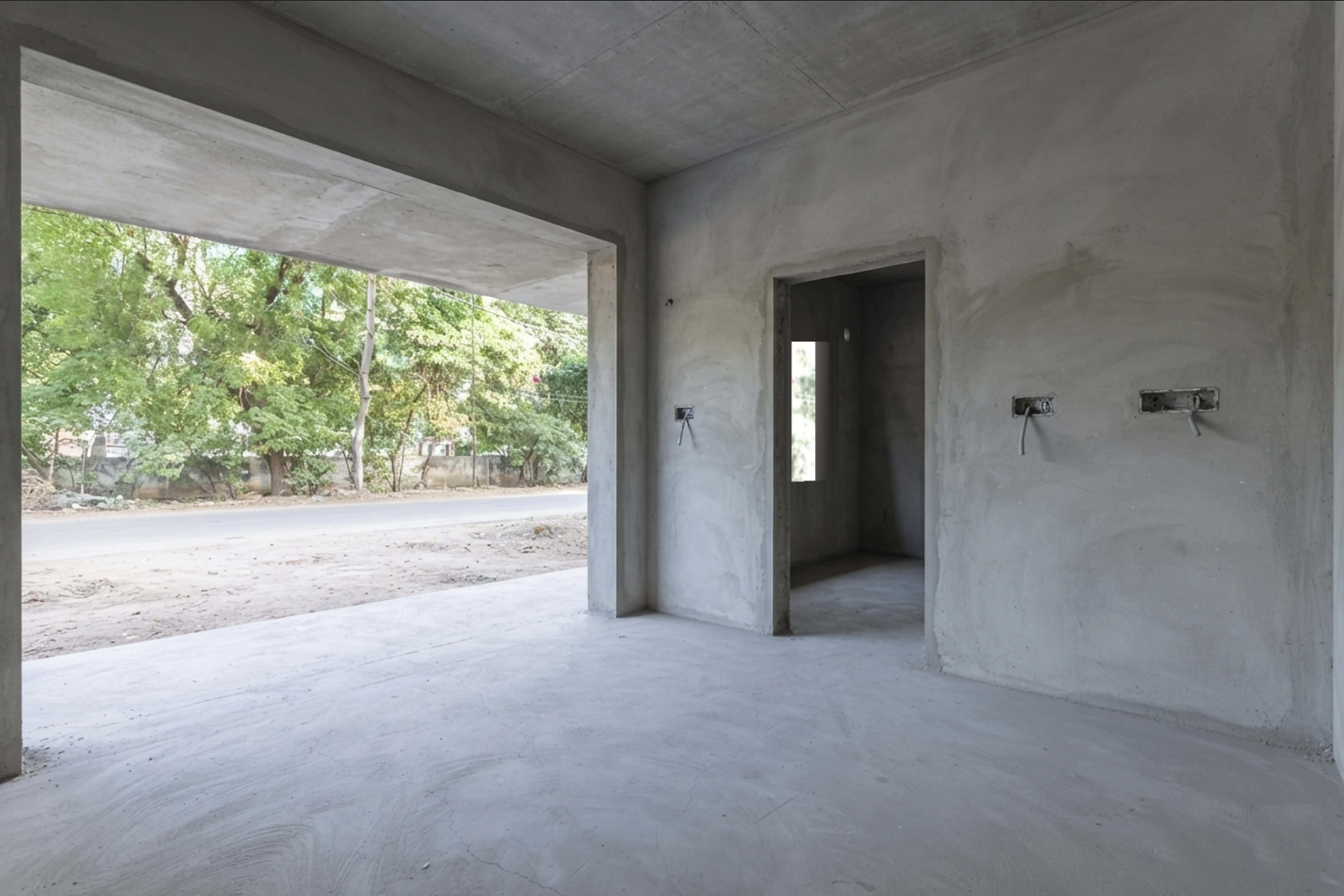 Aura Dental Clinic in Vadodara as a bare cement shell, before Shape My Space began work