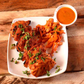 Non-Veg Momos (Tandoori/Chilli Tossed)