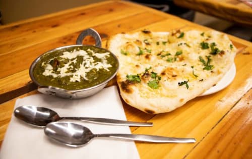 Order CHEESE CHIILY NAAN Online - Tandoori Hub