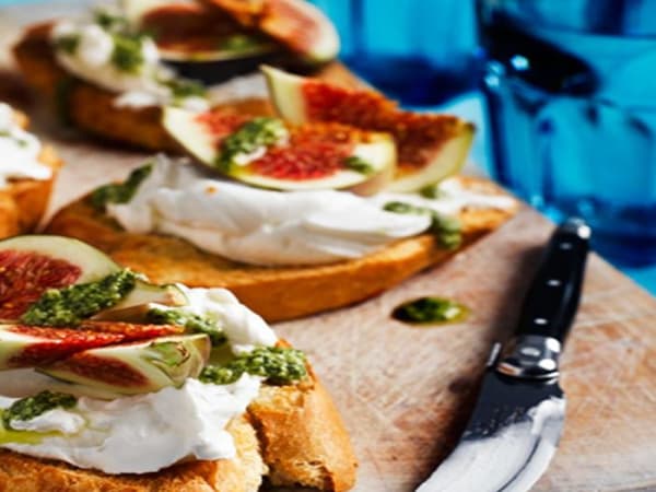 Shop Goat Cheese Bruschetta (V) online at Café B2B. We offer a wide range of delectable meals & specialty AXIL coffee. Order now!