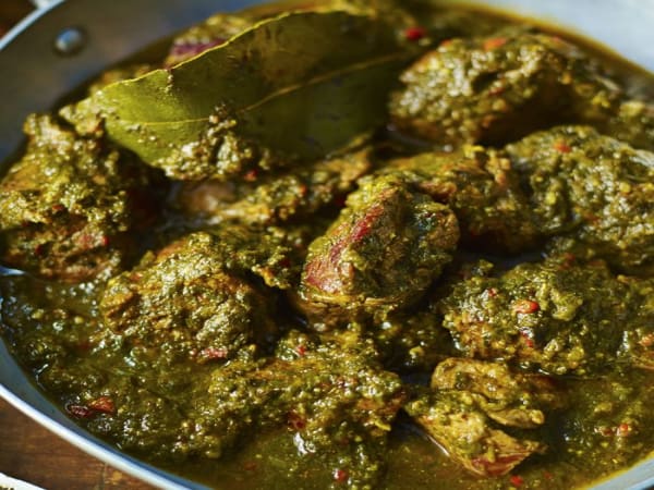 Order GOAT SAAG (on the bone) Online - Khazana