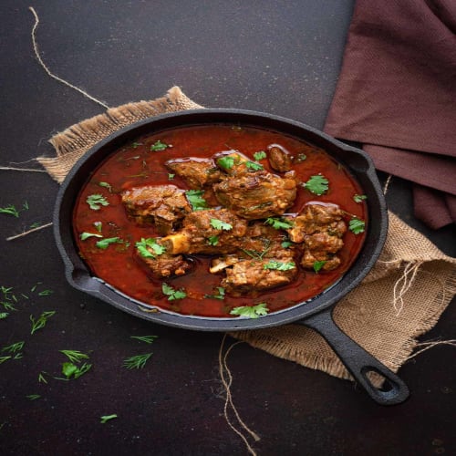 Order Goat Curry  (With Bone) Online - The Tadka Club