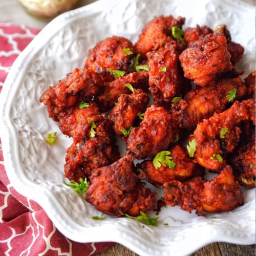 Flavorful Indian-Style Chicken Preparation with Spices | Pakka Local