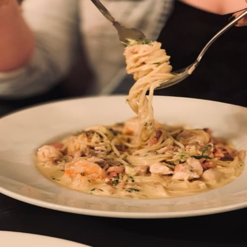 Spaghetti Speciale with Chef’s Signature Sauce | Amici Restaurant Pizzeria