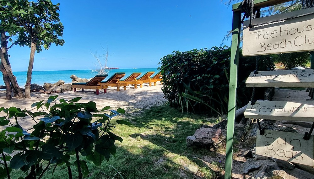 Treehouse Beach Club Sign