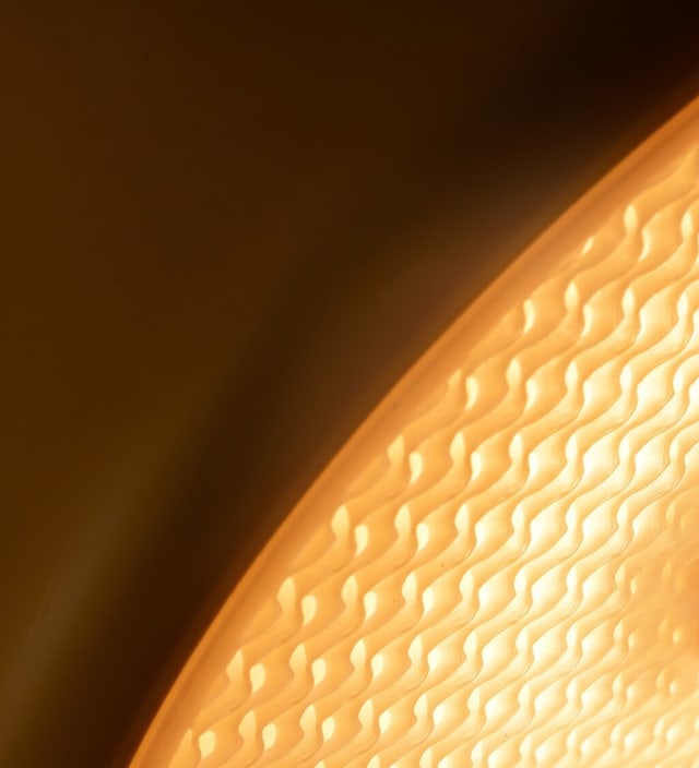 Close-up of the textured PlantPolymer surface of a glowing light
