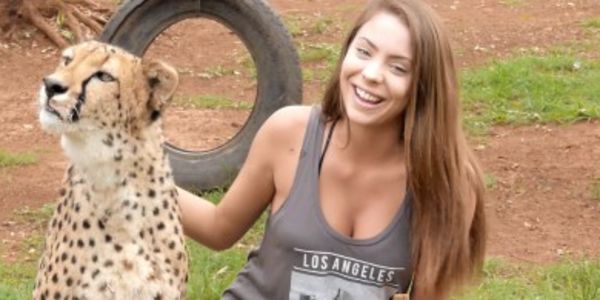 GoEco volunteer with a cheetah