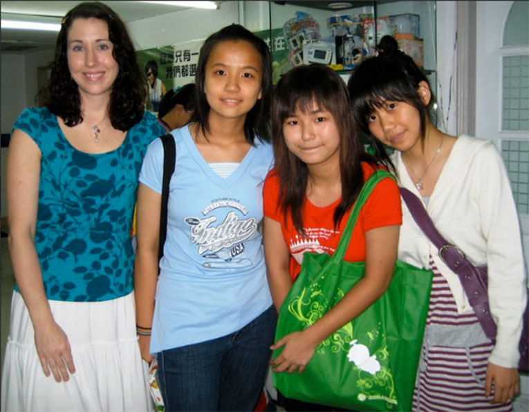 International teachers with students in Asia