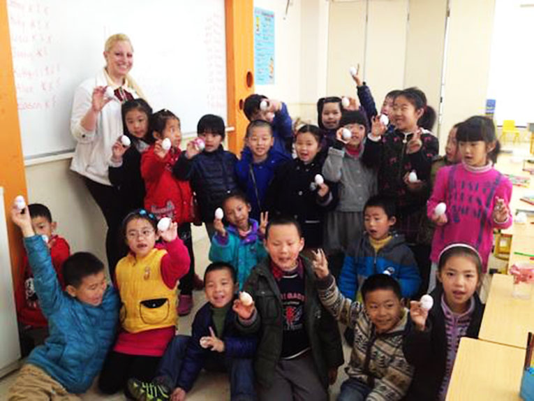 International teacher with students in Shanghai, China