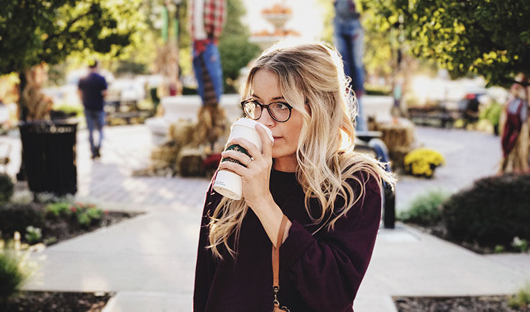 college student drinking coffee