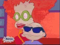 GIF of Tommy from Rugrats wearing sunglasses