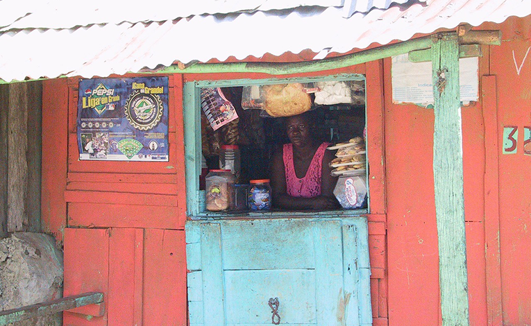 Local woman in her storefront in Haiti