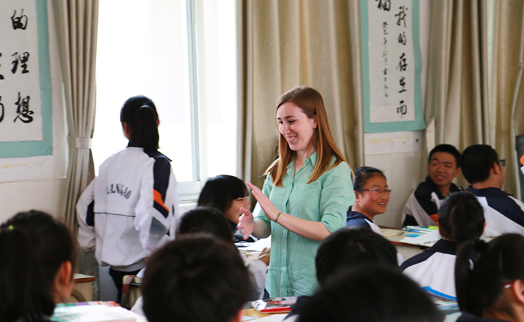 Foreign teacher playing a game with Chinese students