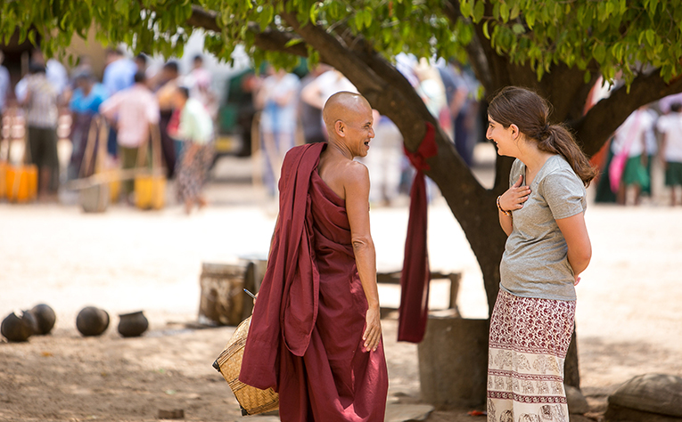Volunteer talking to a local in Myanmar