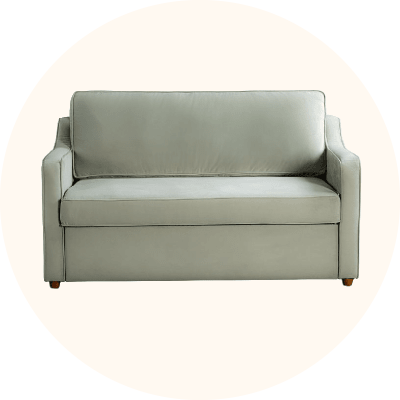 A sage green loveseat sleeper.