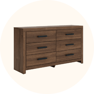 A brown six drawer dresser.