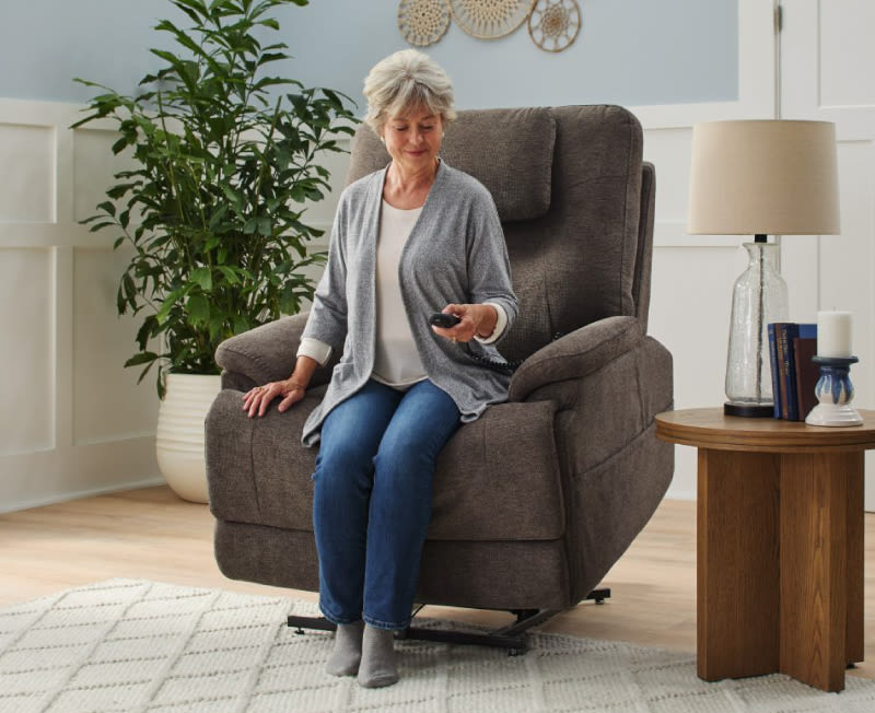 Woman sitting on a reclining chair