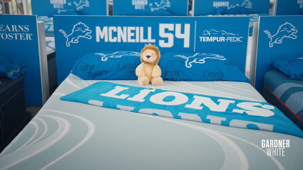 Alim McNeill themed Tempur-Pedic mattress with a plush lion