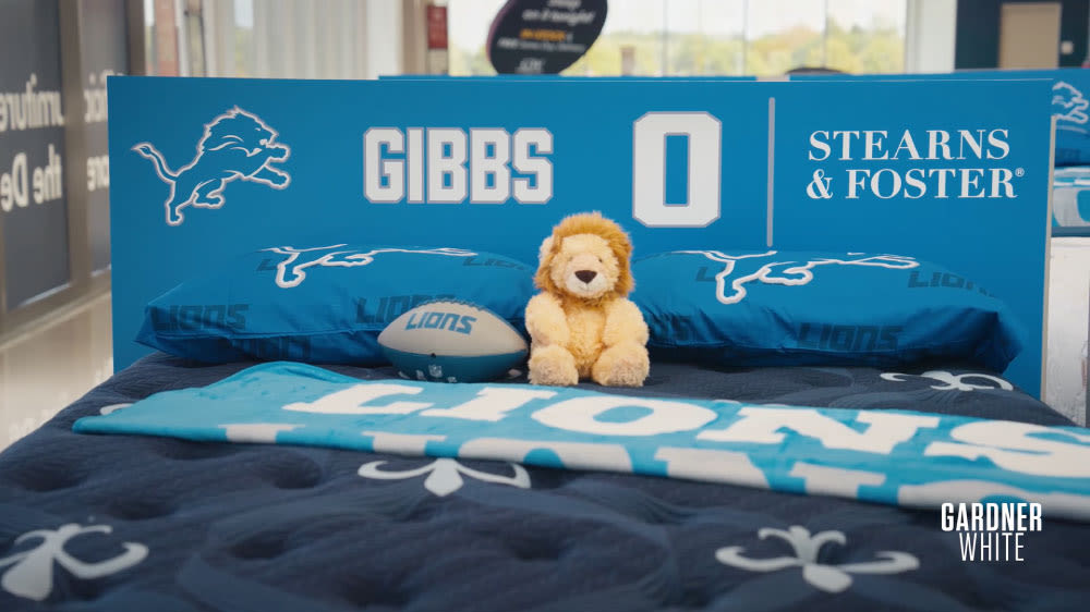 Jahmyr Gibbs themed Stearns & Foster mattress with a plush lion