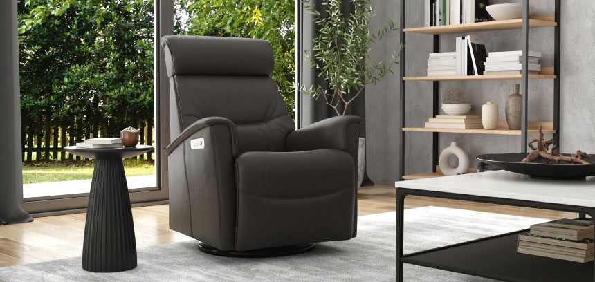 Dark gray Fjords swivel recliner in a modern living room.