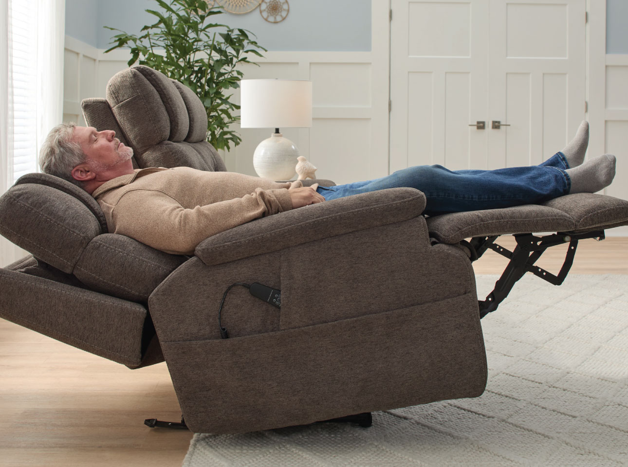 Man sleeping on a recliner