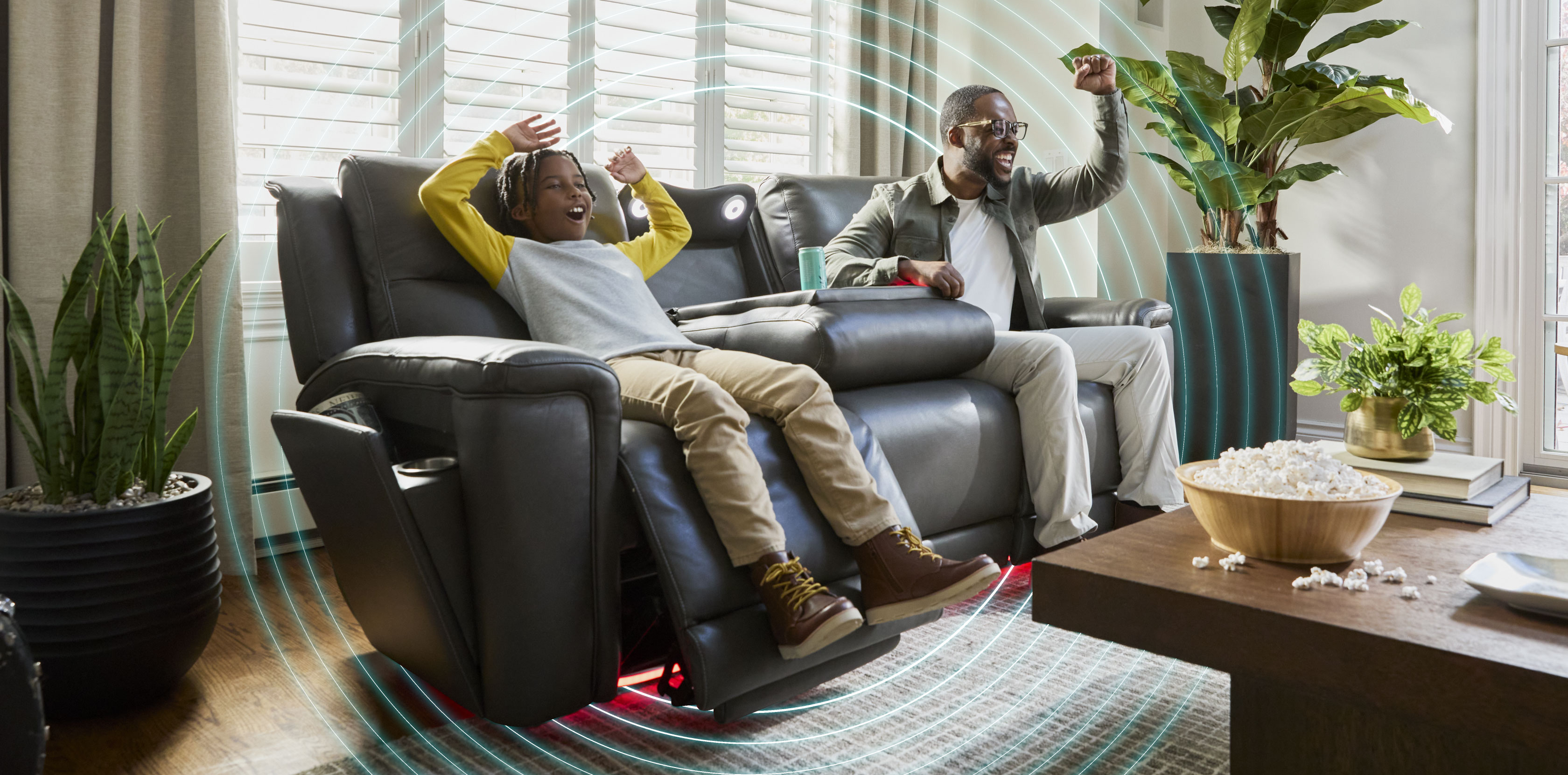 Family enjoying immersive audio in the living room.