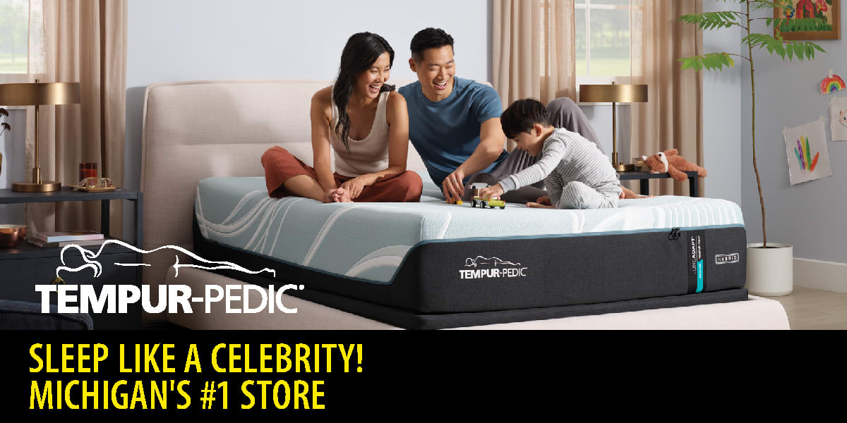 Family relaxing on a Tempur-Pedic bed.