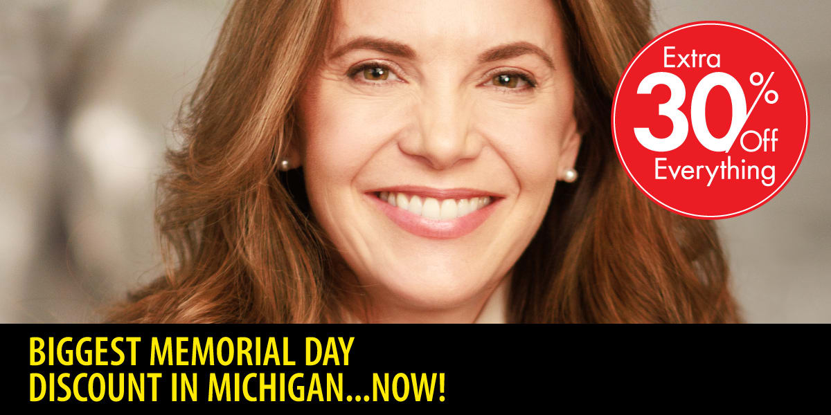 Rachel Stewart, Gardner White's CEO, smiling with the message that the biggest Memorial Day discount in Michigan is at Gardner White.