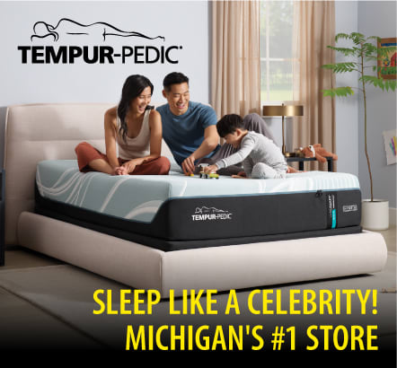 Family relaxing on a Tempur-Pedic bed.