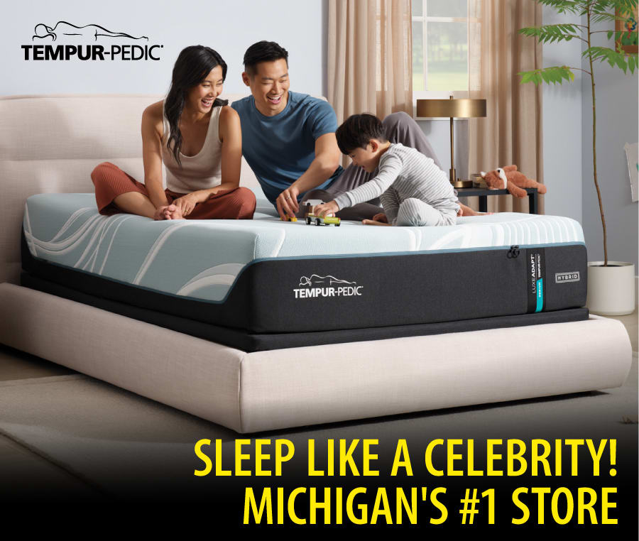 Family relaxing on a Tempur-Pedic bed.