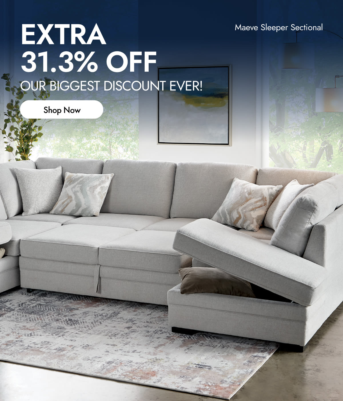 A light gray storage sectional couch with the attached ottoman open showing storage within.