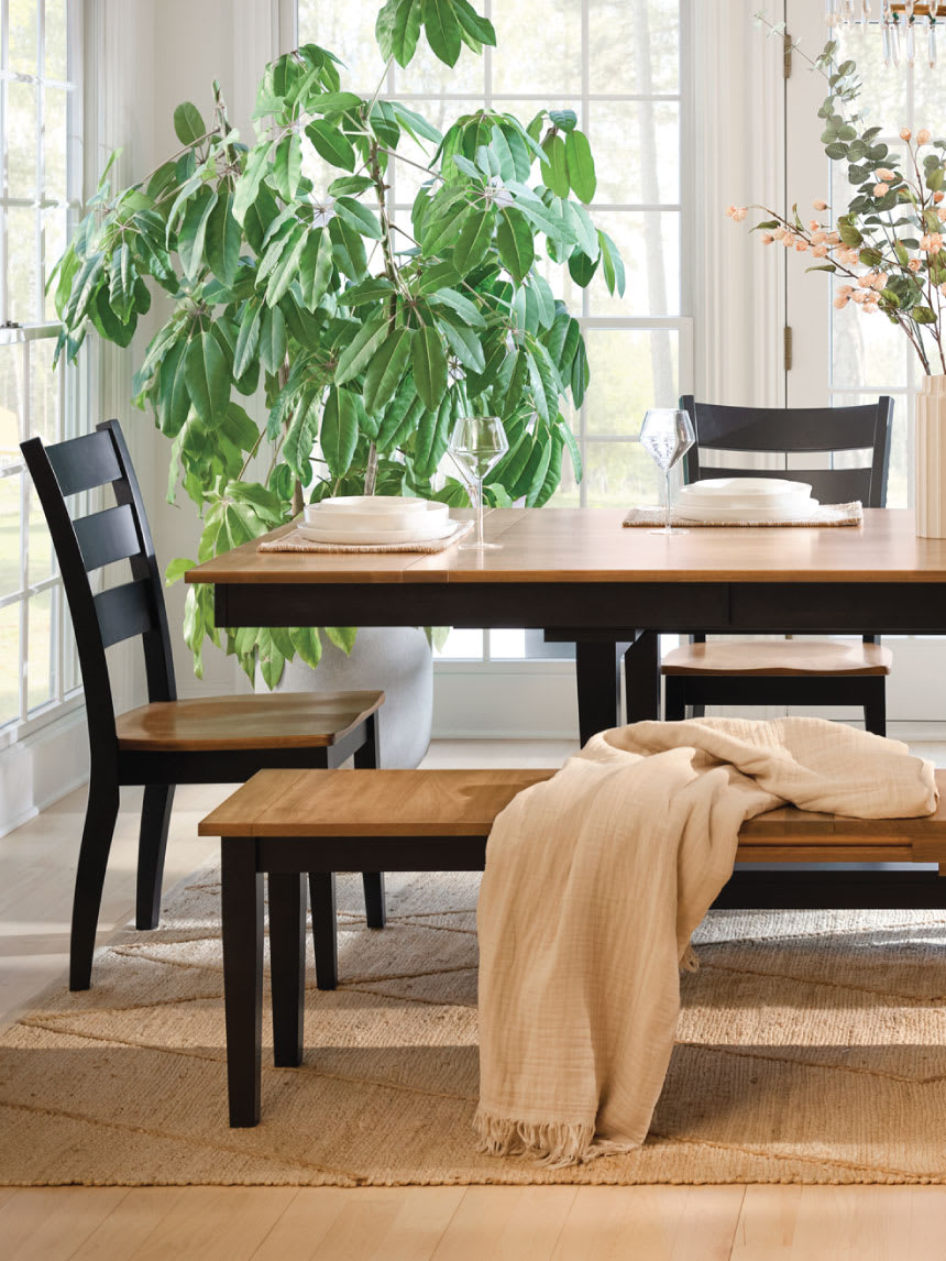 Wooden dining set in a dining room.