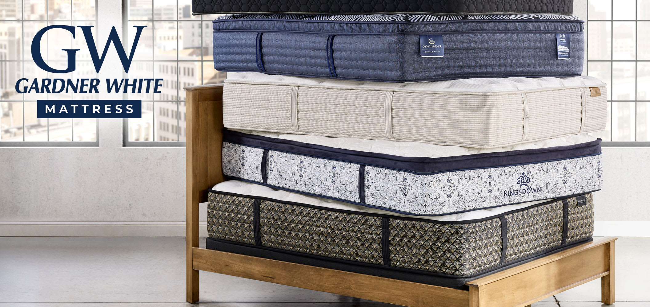 Various mattresses stacked on top of each other