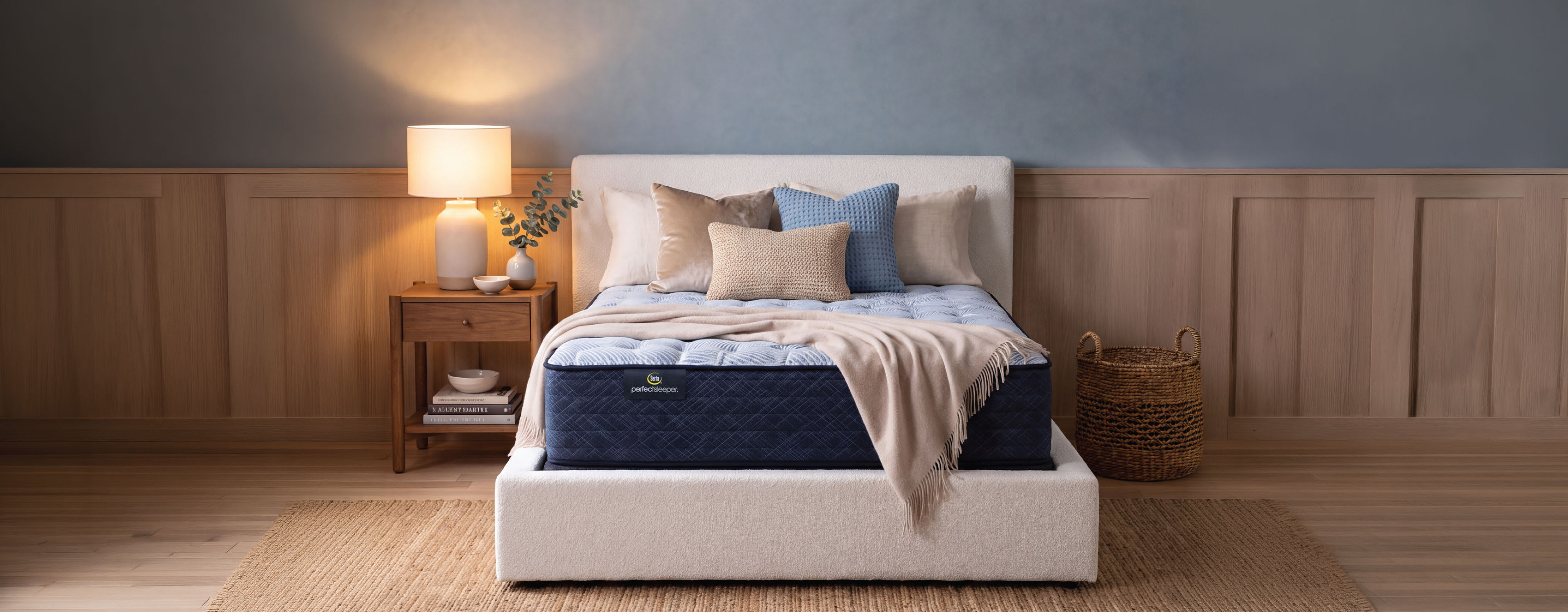 A bedroom featuring a Serta Perfect Sleeper mattress.