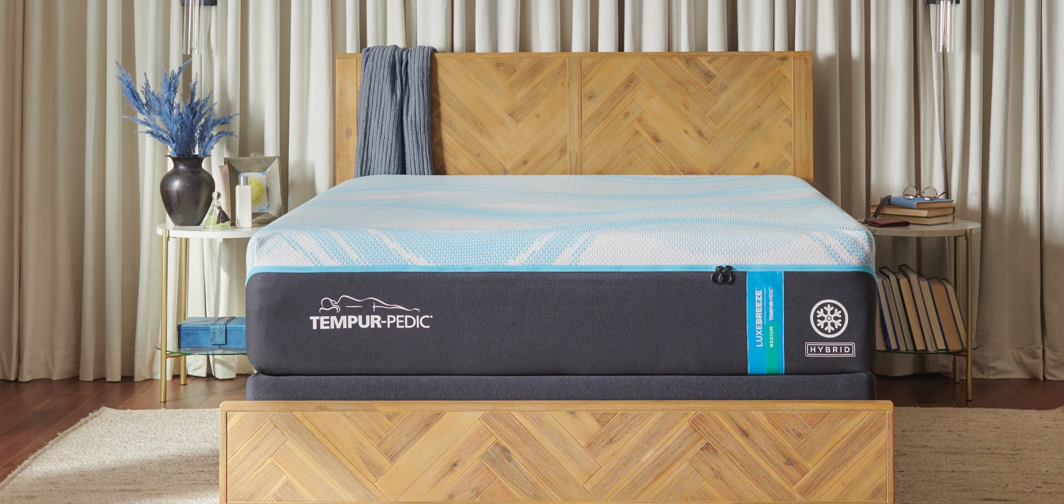 A Tempur-Pedic mattress in a bedroom.