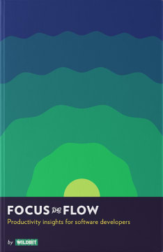 The cover of Focus & Flow: Productivity insights for software developers. A book by Wildbit. The bottom quarter of the book is a dark color containing the title and information with the top of the book showing a yellow-green semi-circle in the bottom middle with concentric wavy circles emanating out and becoming progressively darker.