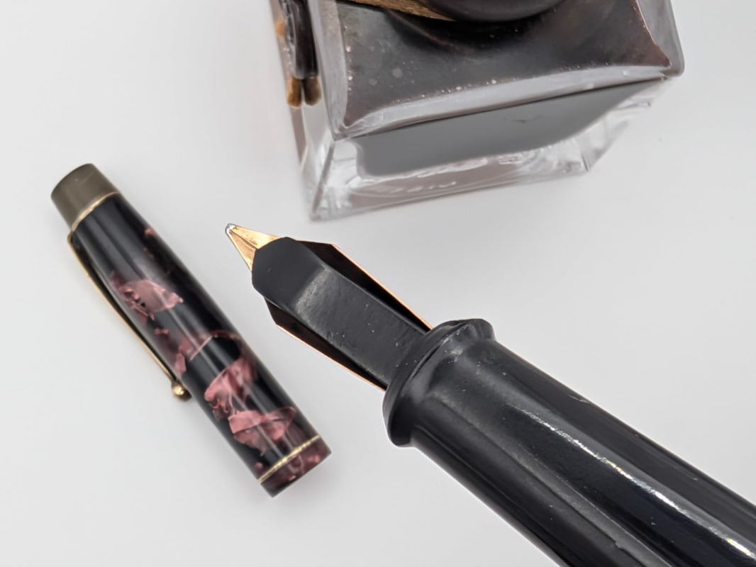 Vintage Onoto 'The Pen' by De La Rue London – Marbled Red & Black Celluloid – 14K Gold Nib – Restored Plunger